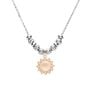 Charm in argento rosato e strass sole