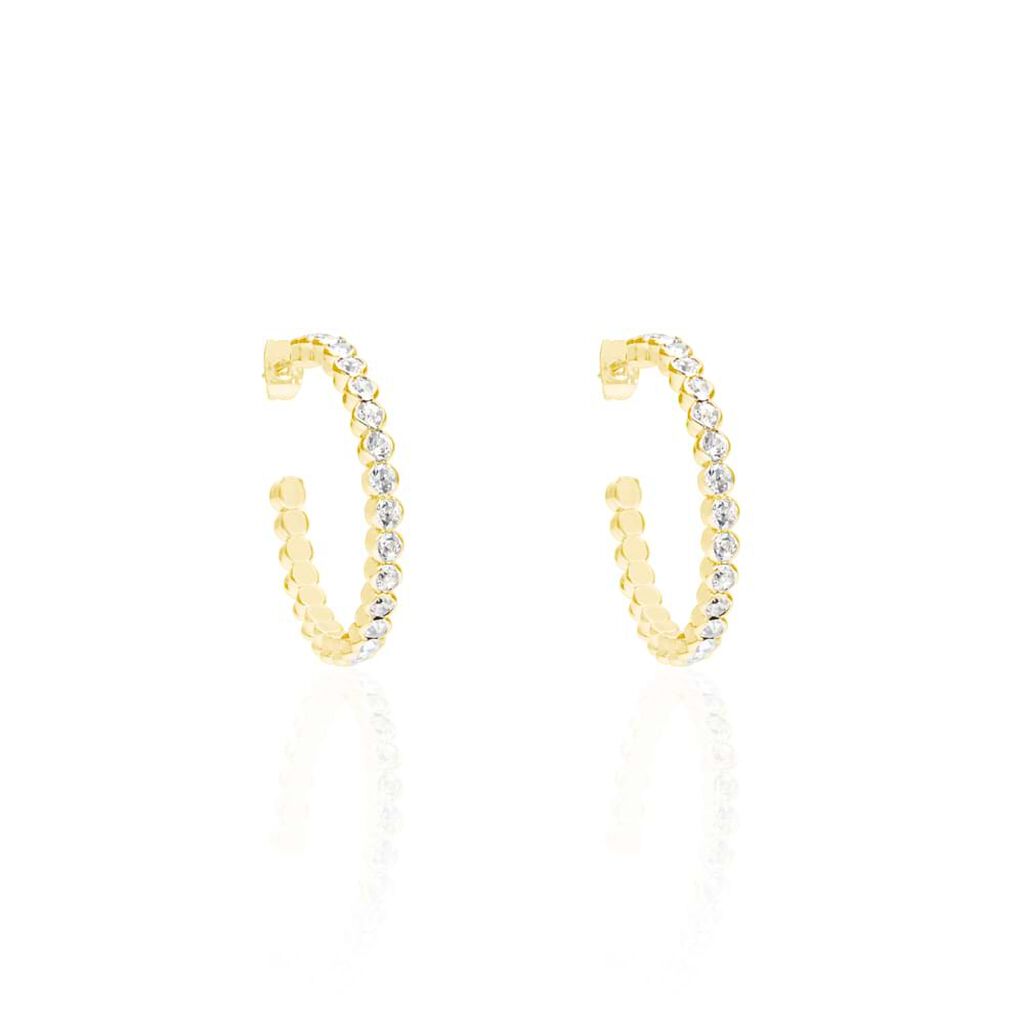 Orecchini a cerchio in metallo dorato e cristalli