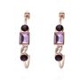 Orecchini a cerchio con pietre sui toni del viola in metallo rosato