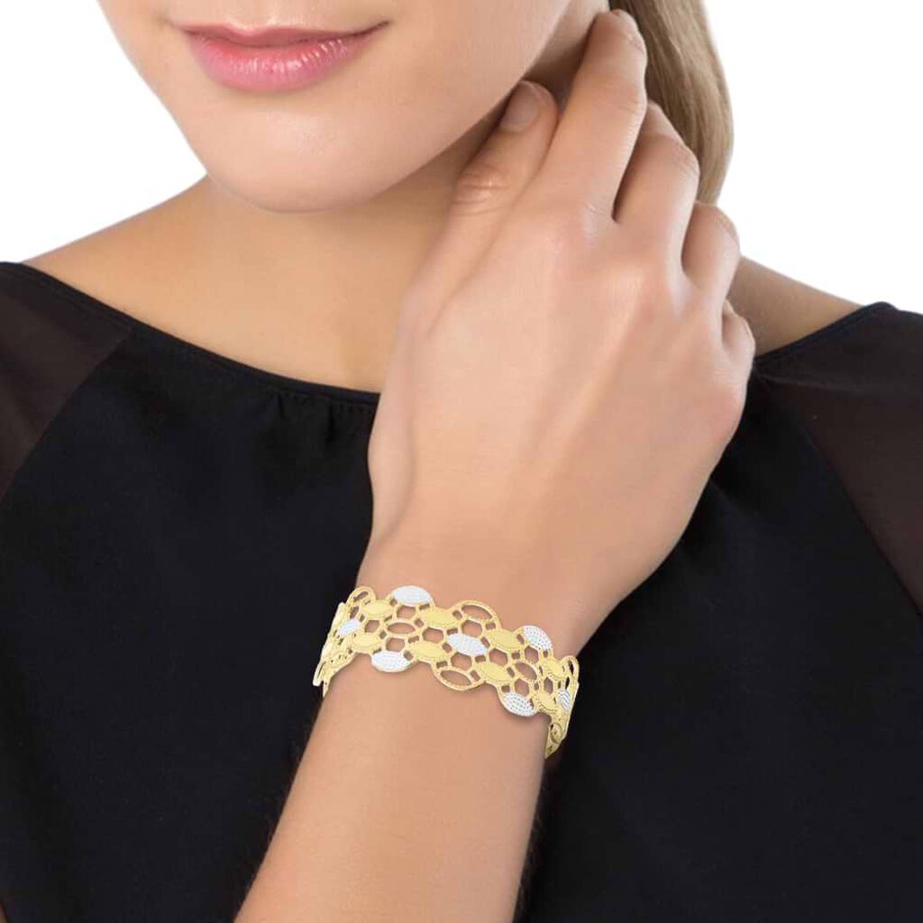 Bracciale rigido medium in bronzo dorato con cerchi