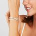 Bracciale rigido rodiato e strass con incrocio - Bracciali Donna | Stroili