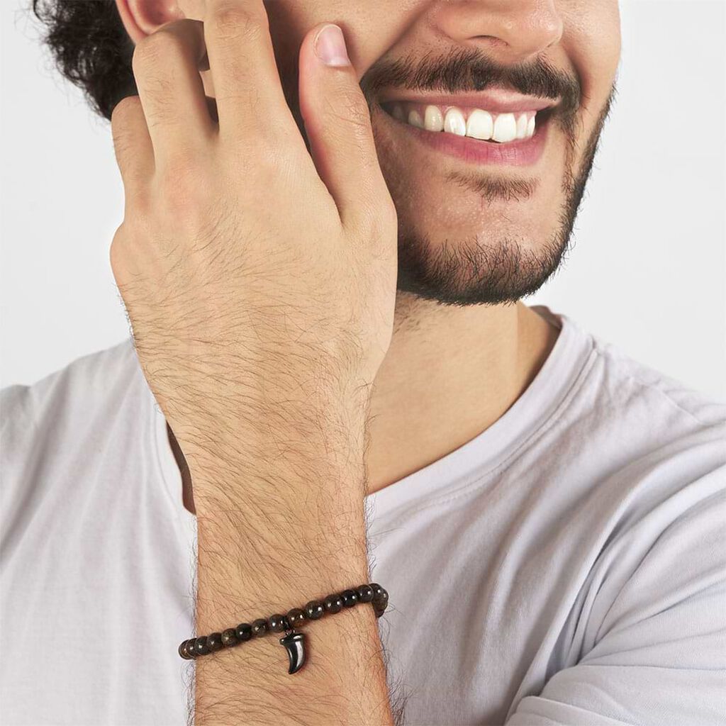 Bracciale elastico con cornino portafortuna in pietre e acciaio