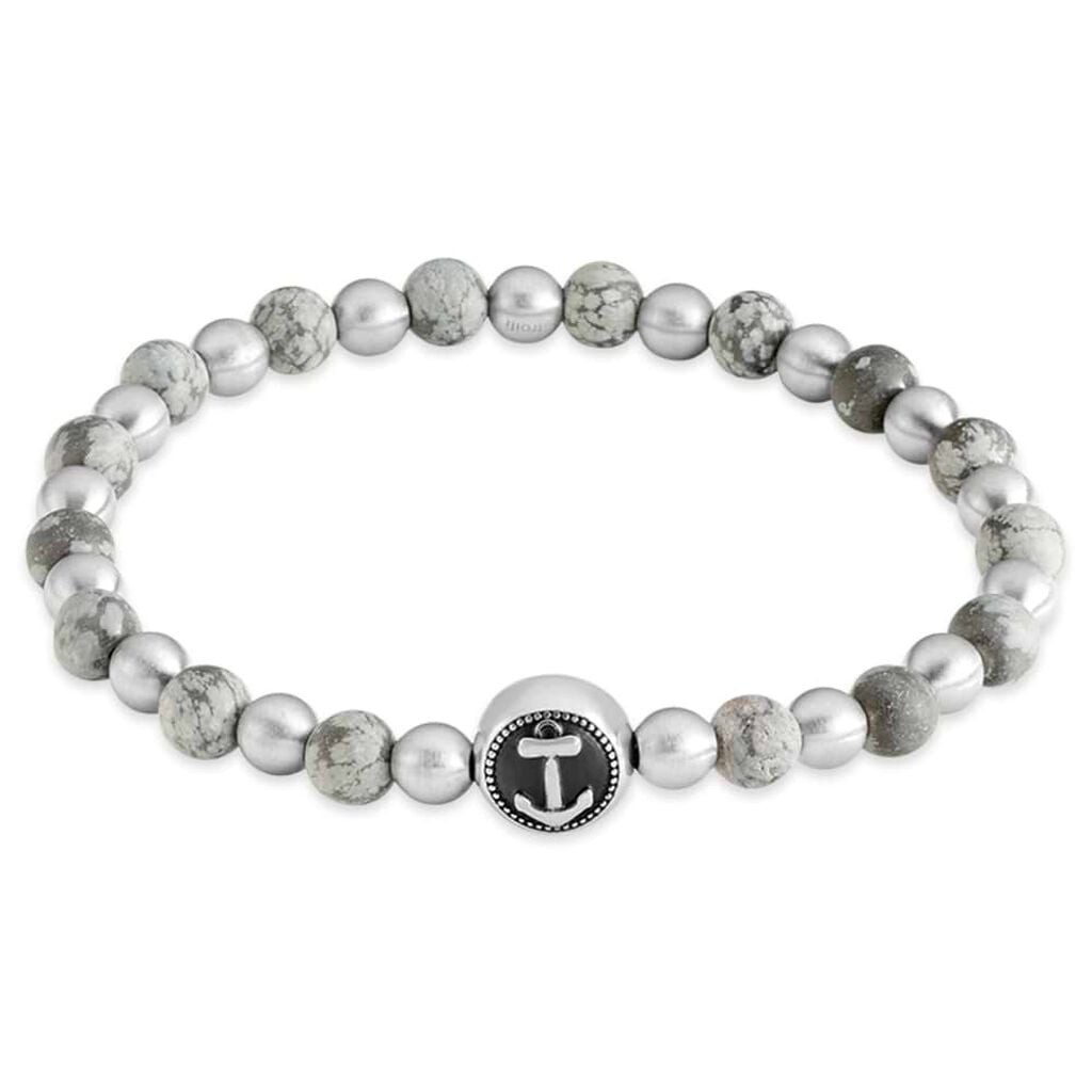 Bracciale elastico con pietre grigie e blu rotonde e dettaglio ancora in acciaio