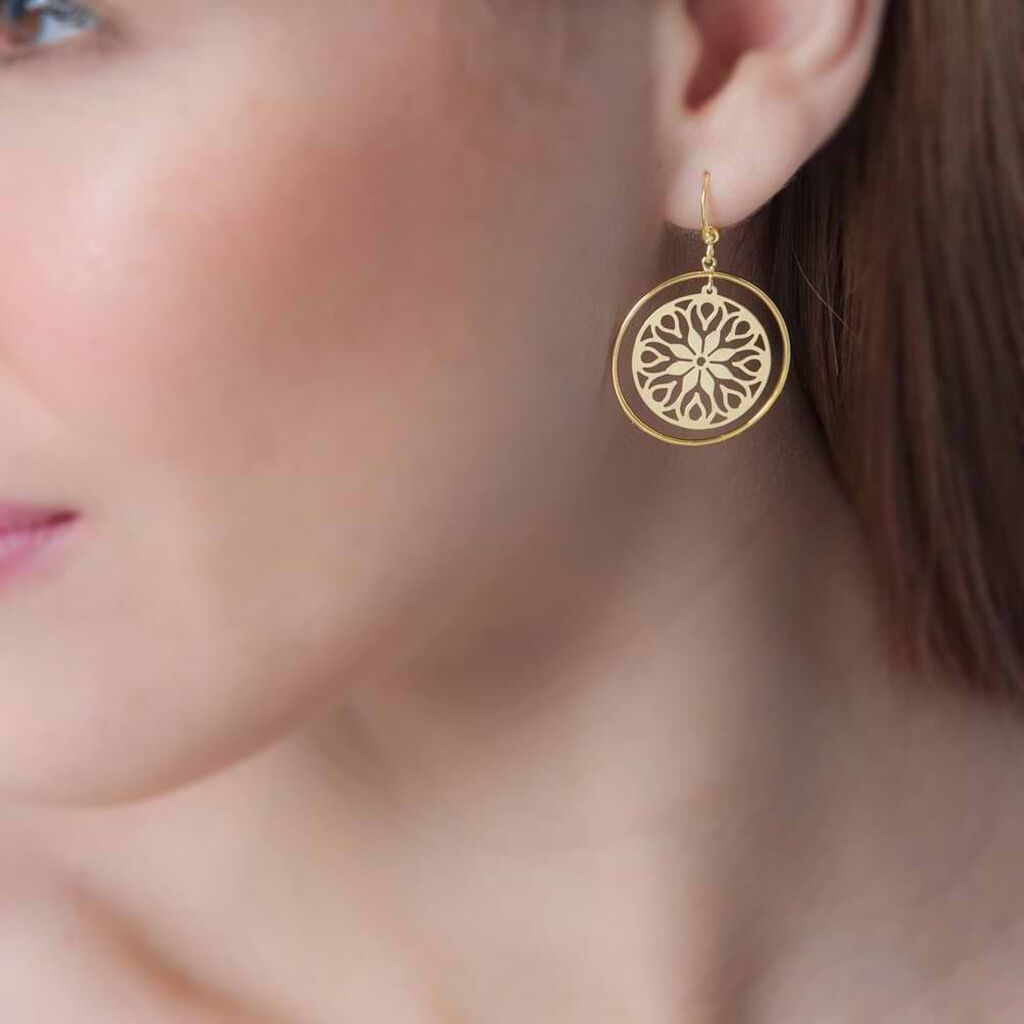 Orecchini pendenti e a monachella in oro giallo